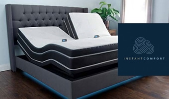 Instant Comfort mattress with brand logo in bedroom setting