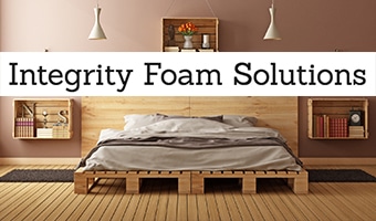 ntegrity Foam Solutions Mattress with brand logo in bedroom setting