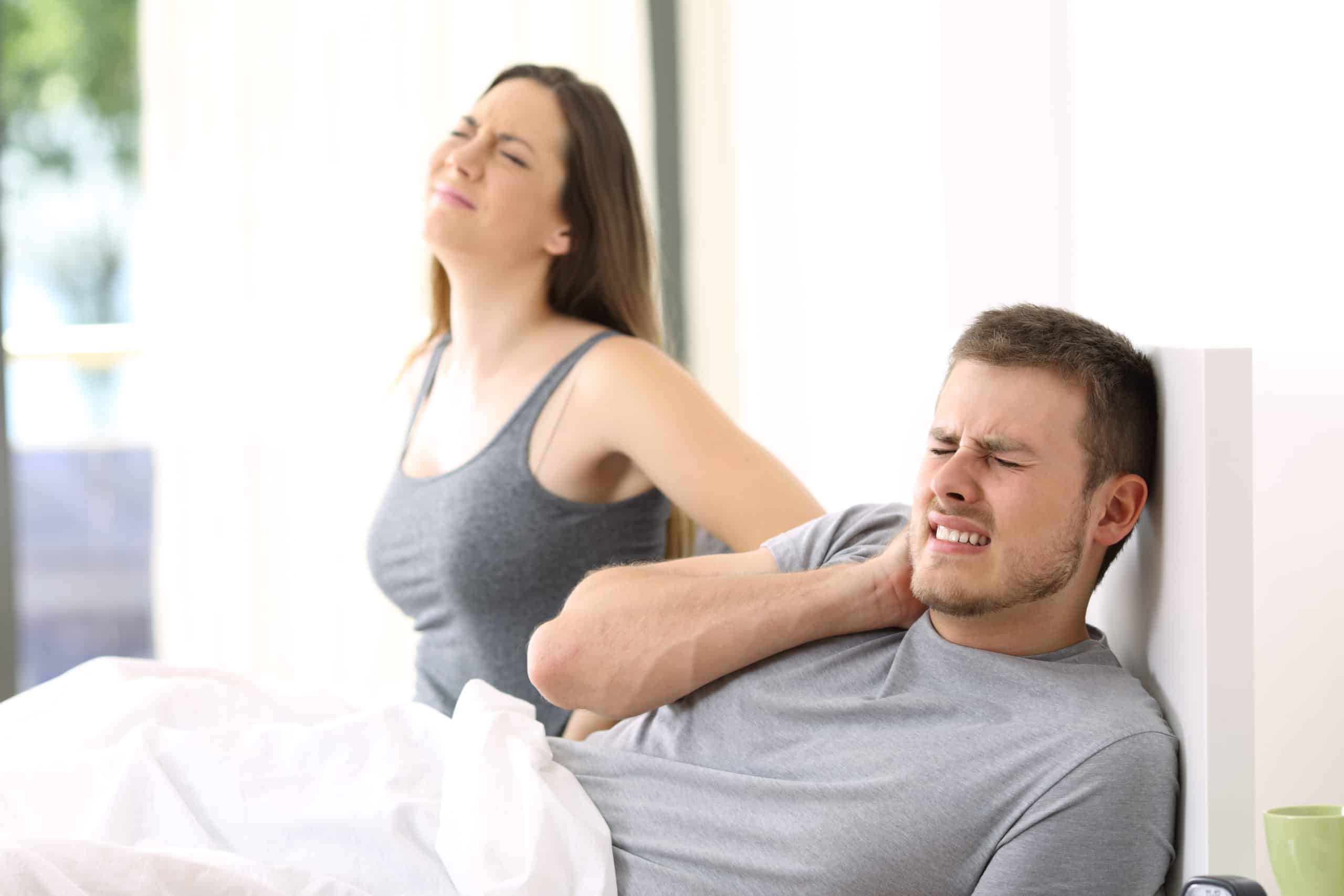 couple in pain after sleeping on bad mattress
