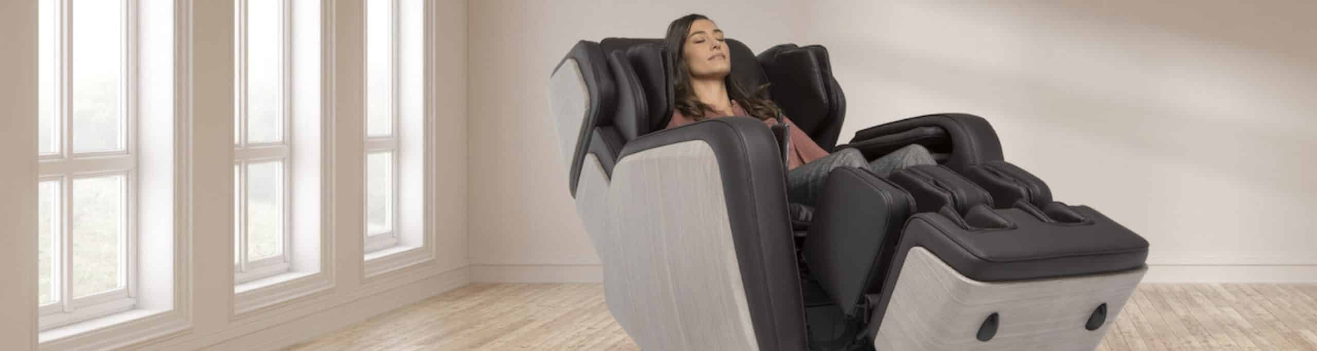 Woman relaxing the best massage chairs in a sun-filled room