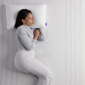 Woman sleeping on Purple Premier 3 Mattress