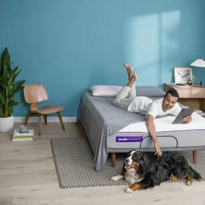 Man laying on Purple Premier 3 Mattress