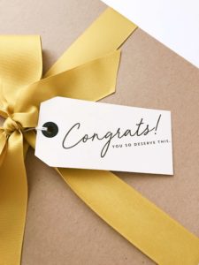 image of gift that says "congrats, you deserve it"